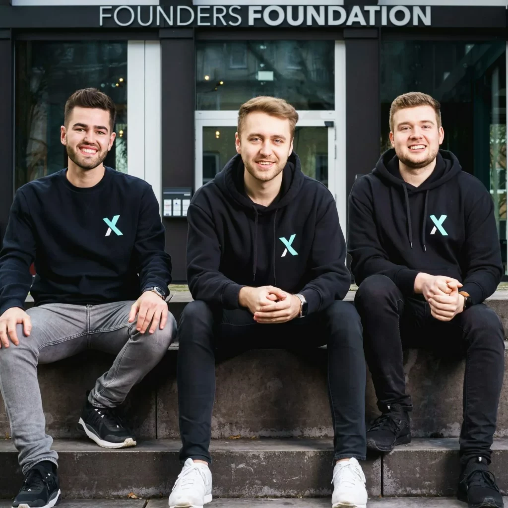 The three Saasmetrix founders in front of the Founders Foundation office